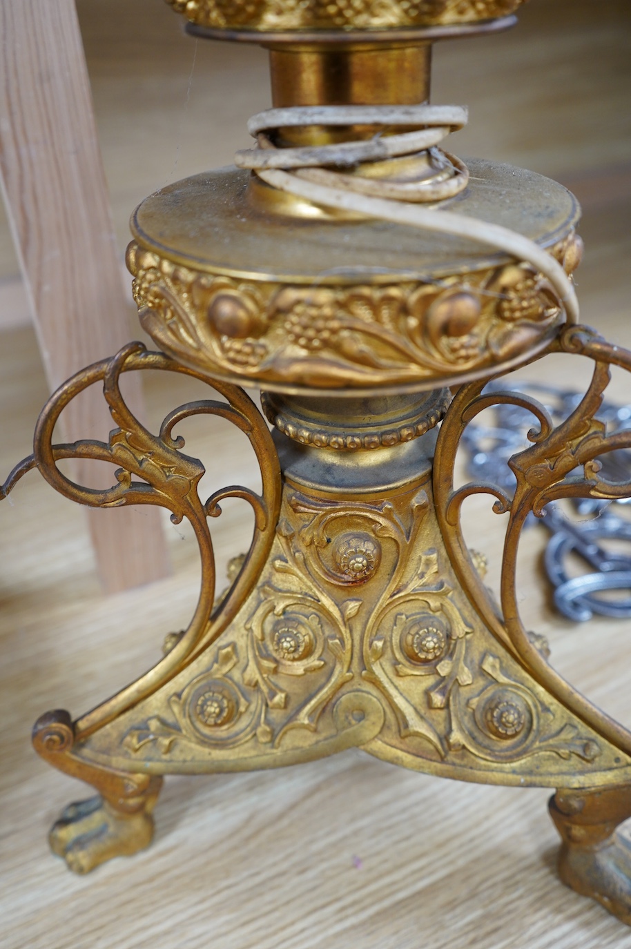 A gilt metal table lamp, 56cm high. Condition - good.